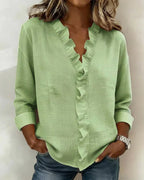 Blusa Elegante con Escote en V y Volantes Delicados