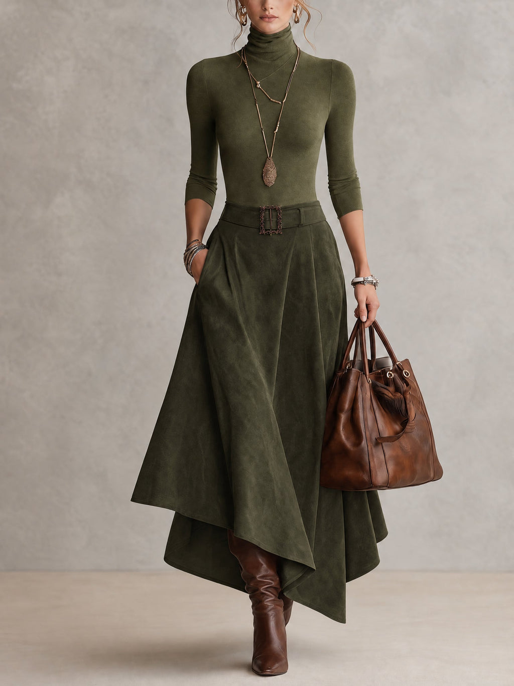 Conjunto Renata de top cuello alto y falda asimétrica de gamuza en color verde