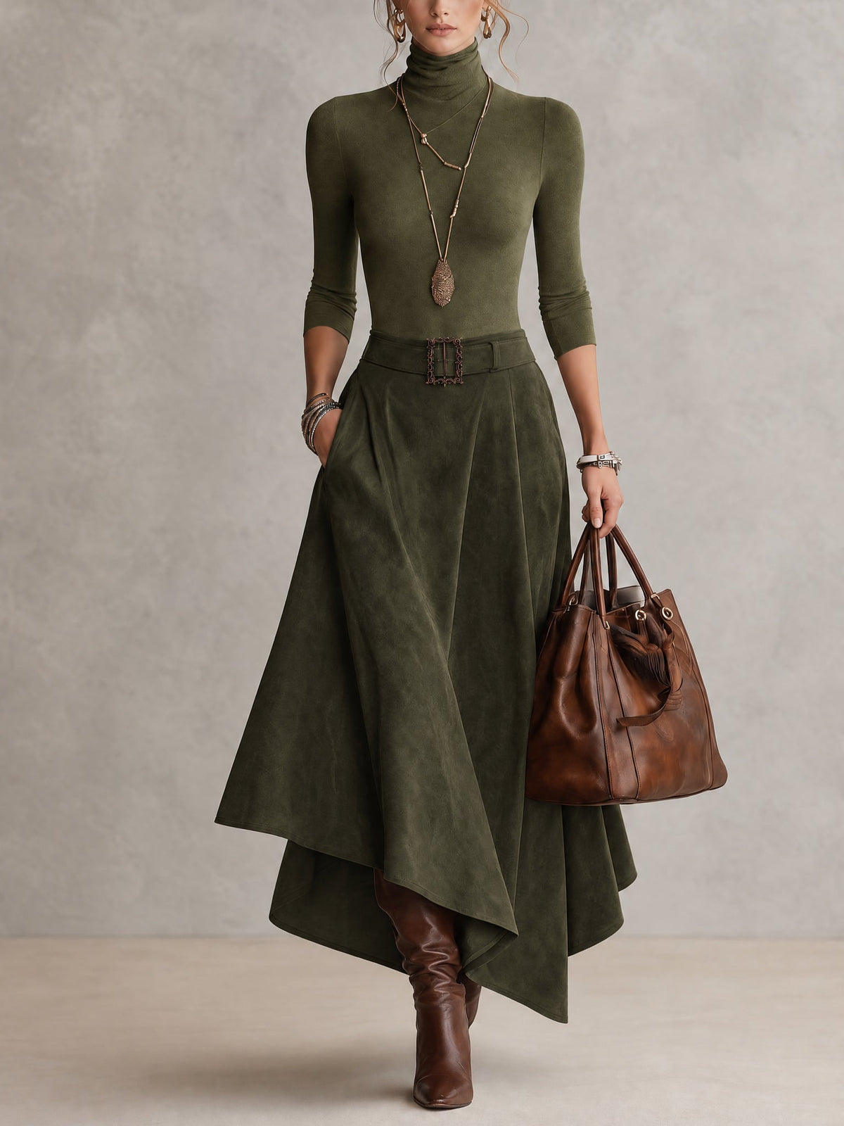 Conjunto Renata de top cuello alto y falda asimétrica de gamuza en color verde