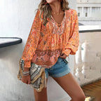 Blusa Floral Elegante de Mujer con Corte Fluido