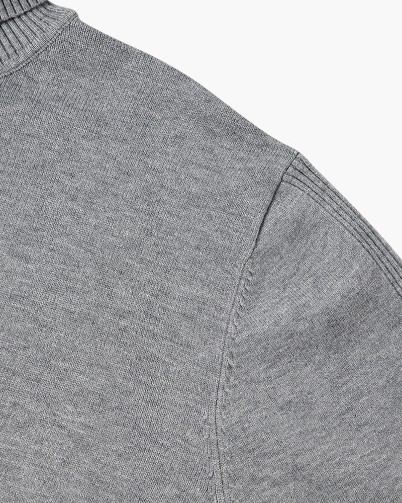 JANGSAN Suéter de lana merino con cuello alto