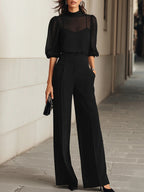Valentina | Conjunto negro tres piezas con top transparente y pantalón ancho
