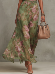 Paola | Robe longue fluide florale qui met en valeur la silhouette