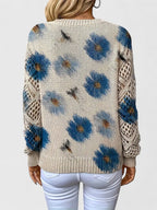 Jersey Elegante con Estampado Floral y Mangas Aireadas
