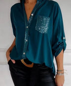 Blusa Negra con Detalles Brillantes de Corte Fluido