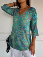 Bruna | Blusa fluida elegante con estampado refinado
